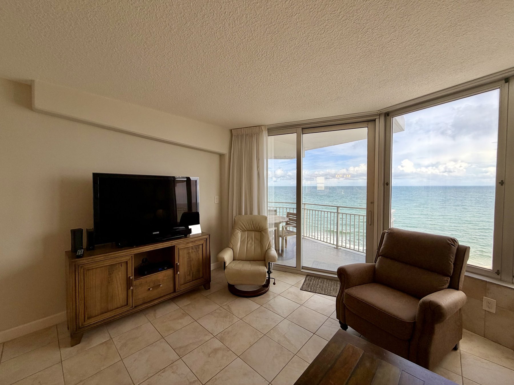 Additional oceanfront living room view in rental unit 1003