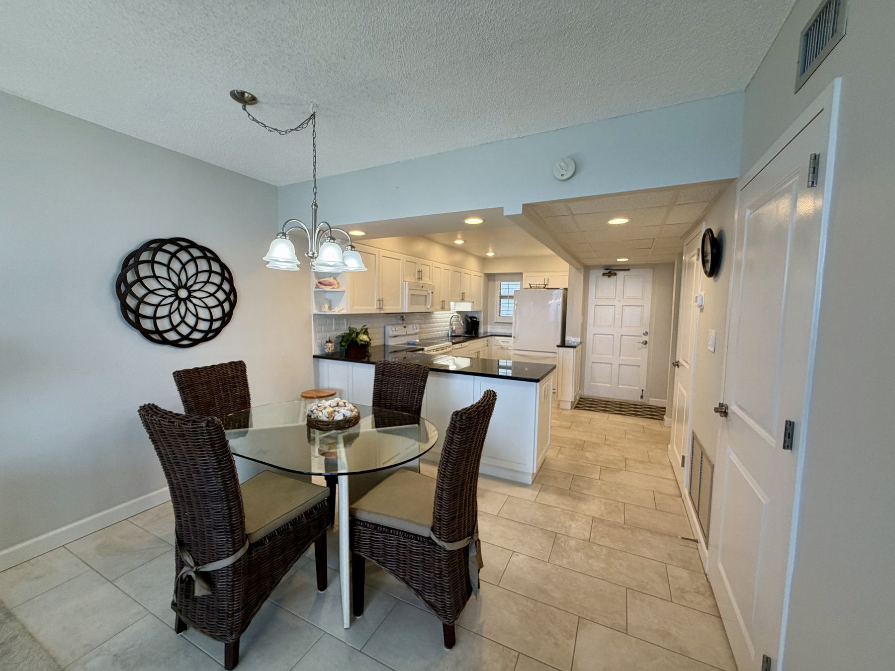 Dining area and kitchen in rental unit 1004