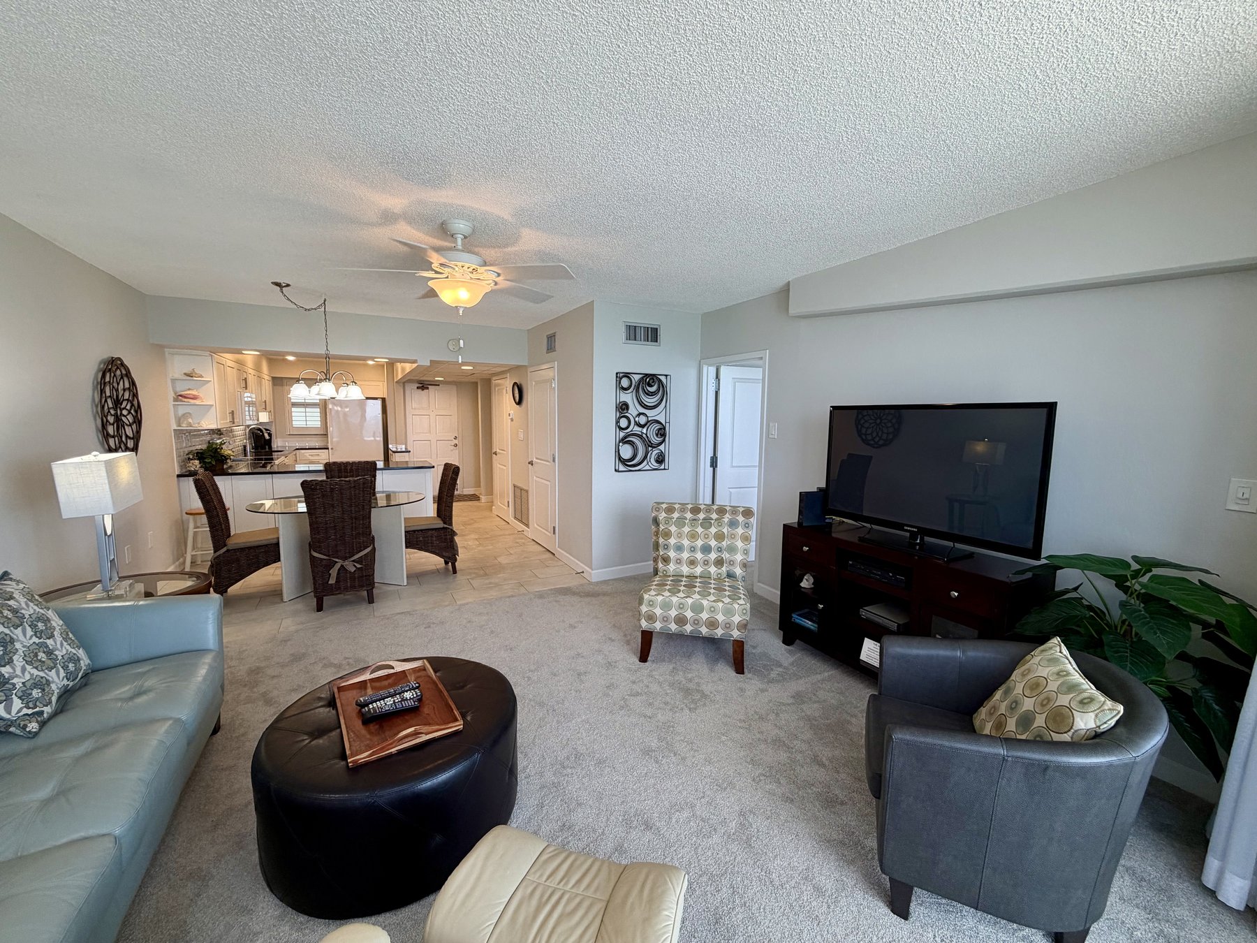 Reverse view of the living and dining areas in rental unit 1004