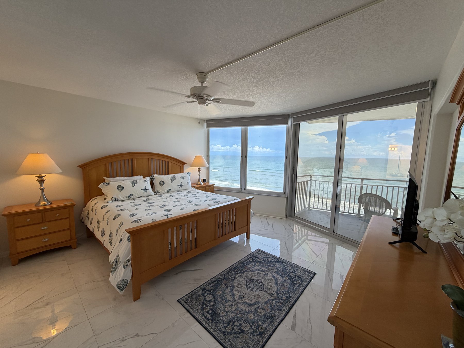 Oceanfront primary bedroom in rental unit 906