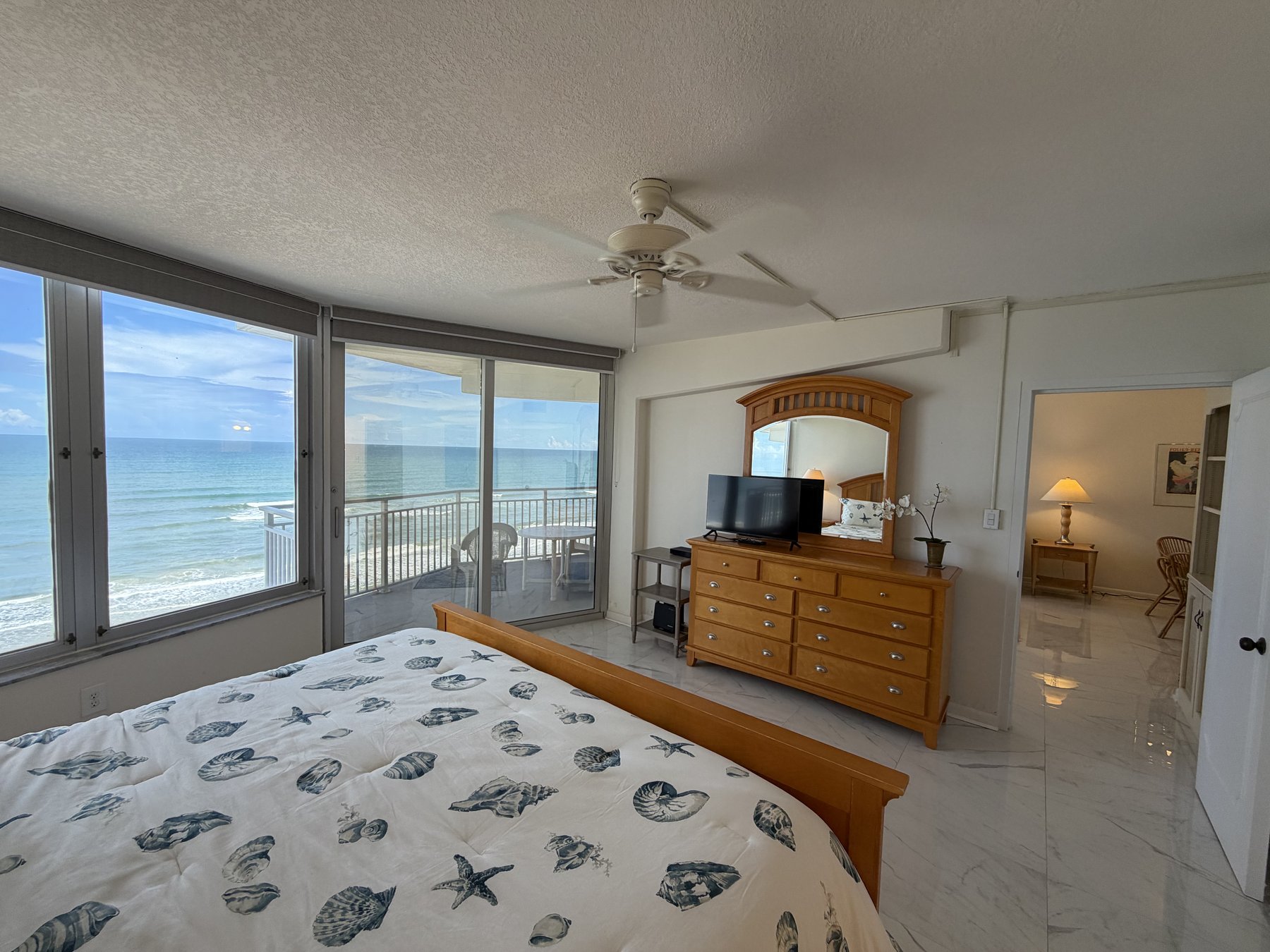 Oceanfront primary bedroom in rental unit 906
